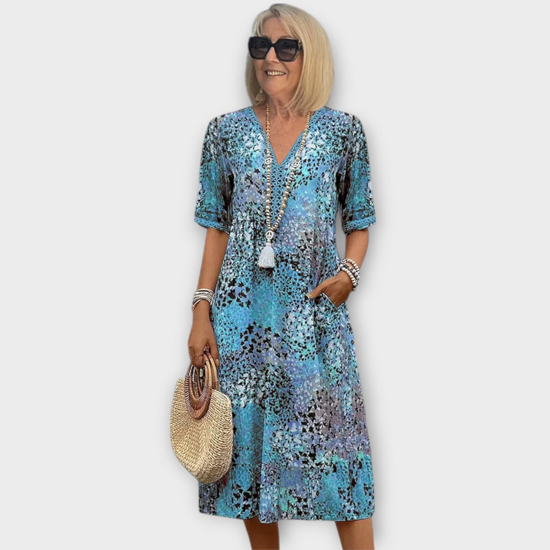 סלסט | שמלה אלגנטית עם מחשוף בצורת V