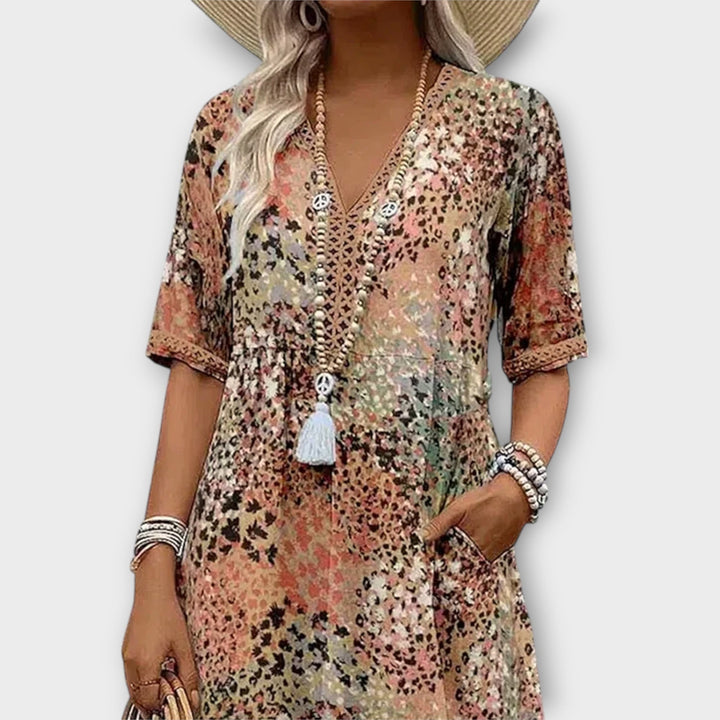 סלסט | שמלה אלגנטית עם מחשוף בצורת V