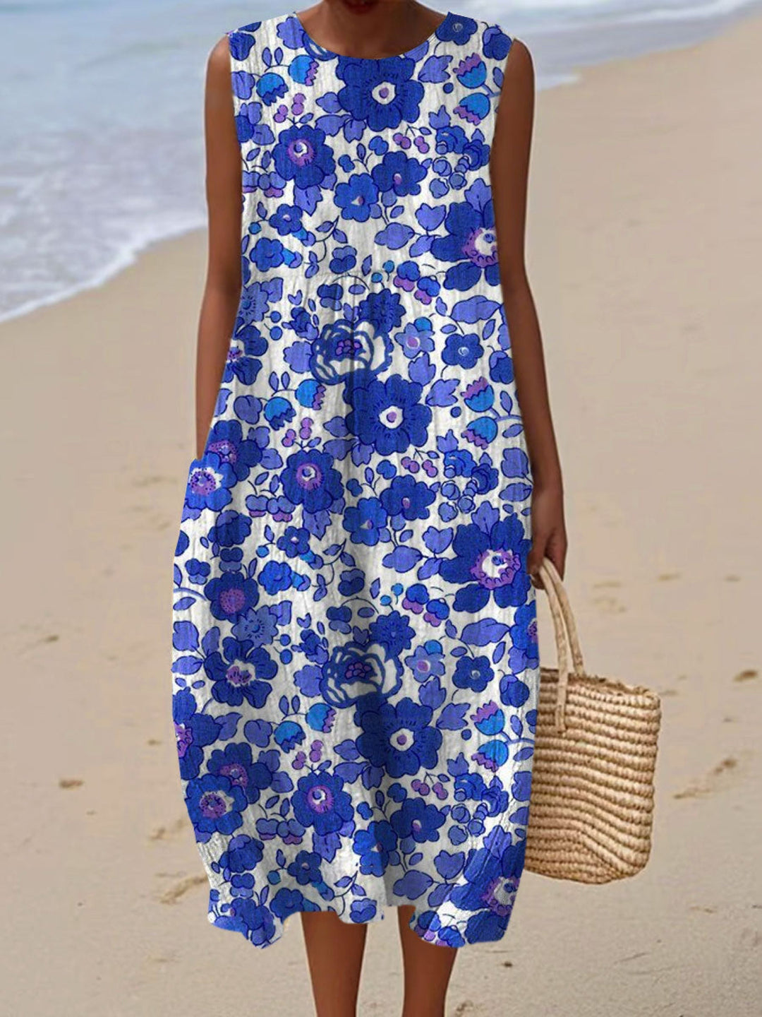 שמלת בלום כחולה עם הדפס פרחים נועז