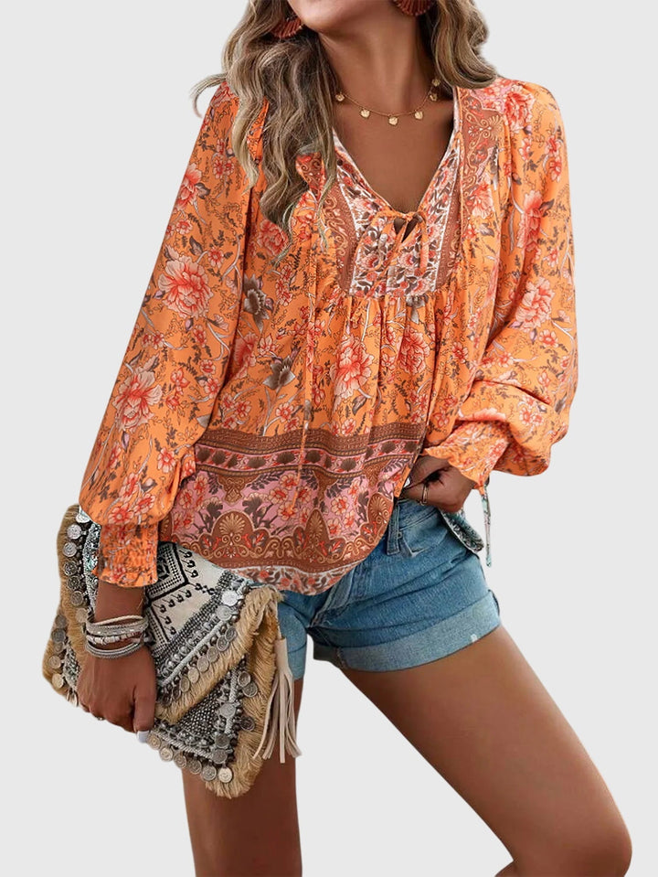 פולו אלגנטי עם דוגמה פרחונית וגזרה רפויה