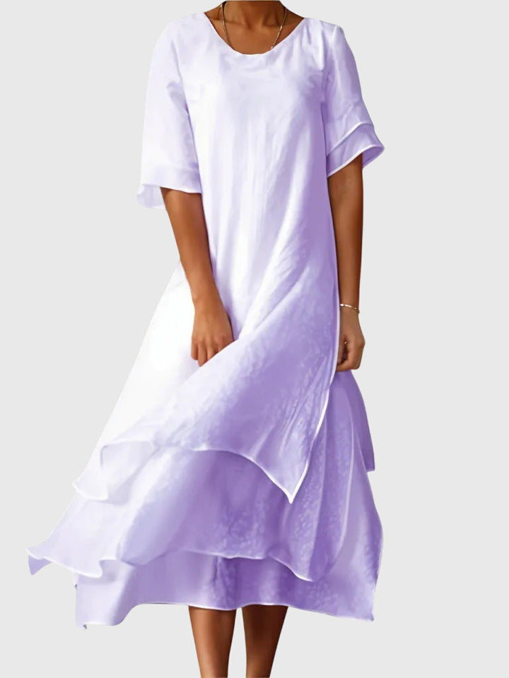 שמלת אפריל אלגנטית עם צווארון פתוח וחיתוך זורם